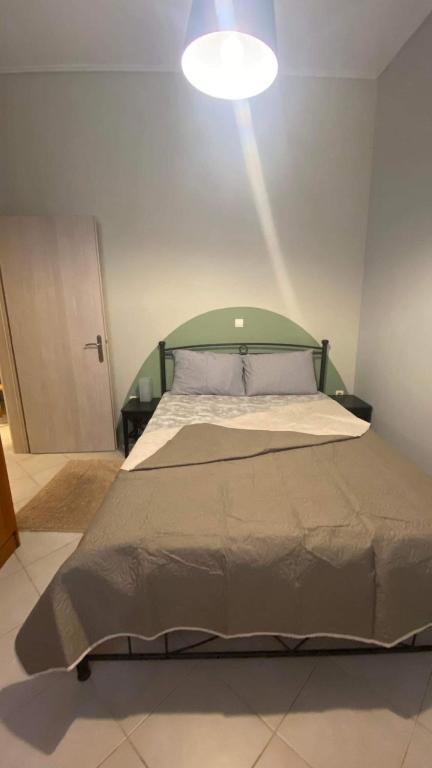 Postel nebo postele na pokoji v ubytování cozy minimal apartment