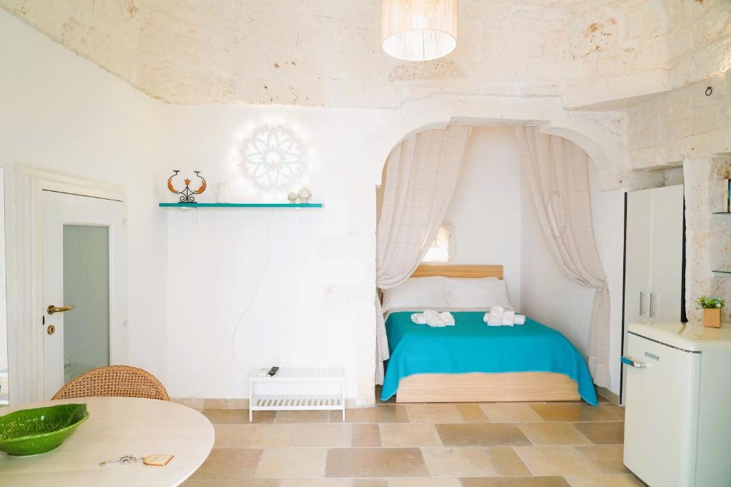 Postel nebo postele na pokoji v ubytování Casetta a due passi - dal CENTRO STORICO