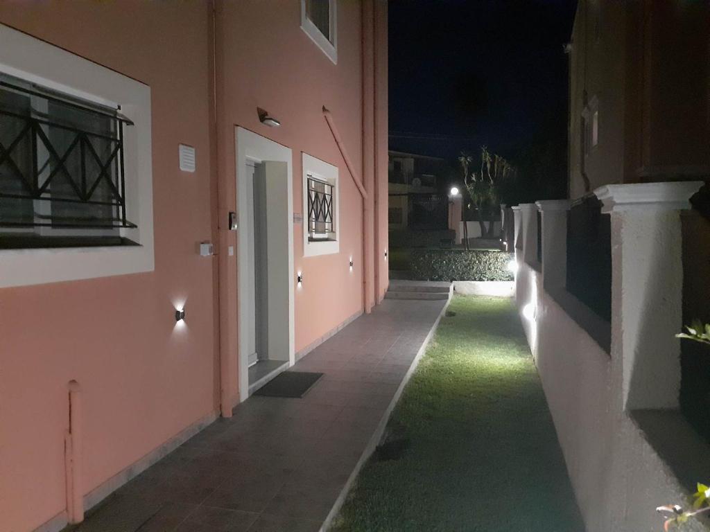 an empty hallway of a building at night at Casa Raymo in Kanálion