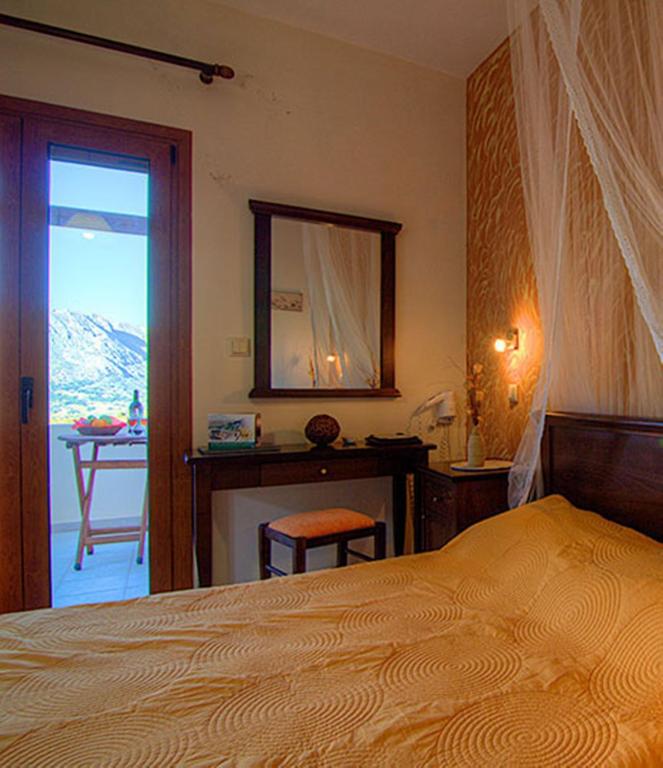 A bed or beds in a room at Elia Meronas