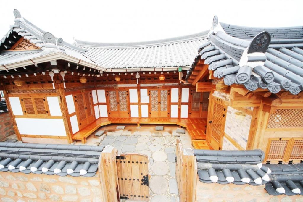 a model of an asian building with a roof at Gawondang in Jeonju