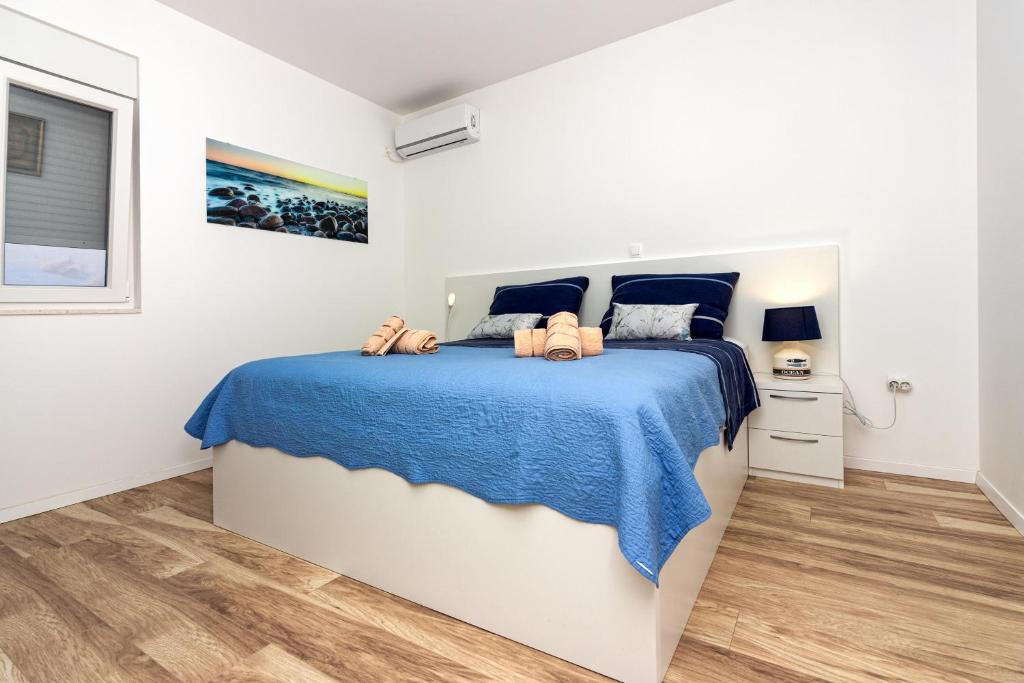 Posteľ alebo postele v izbe v ubytovaní Apartment ASTRID 5 m from BEACH