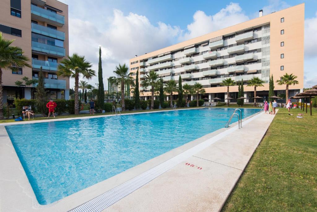 Bazén v ubytovaní UNIVERSITY & TECH PARK MALAGA APARTMENT alebo v jeho blízkosti