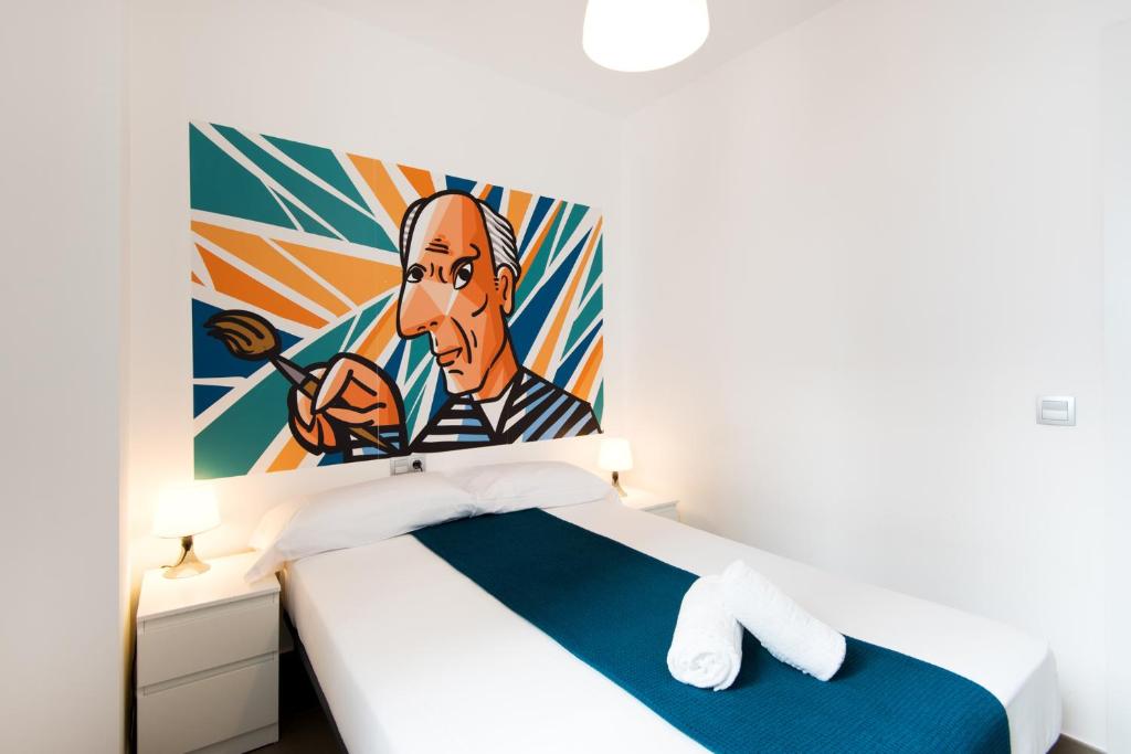 Posteľ alebo postele v izbe v ubytovaní UNIVERSITY & TECH PARK MALAGA APARTMENT