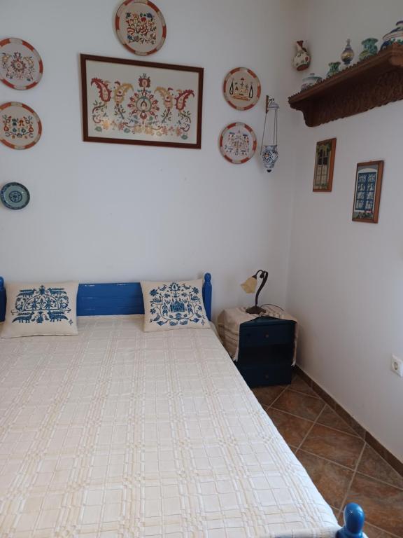 Postel nebo postele na pokoji v ubytování LALAROUS Studios & Apartments