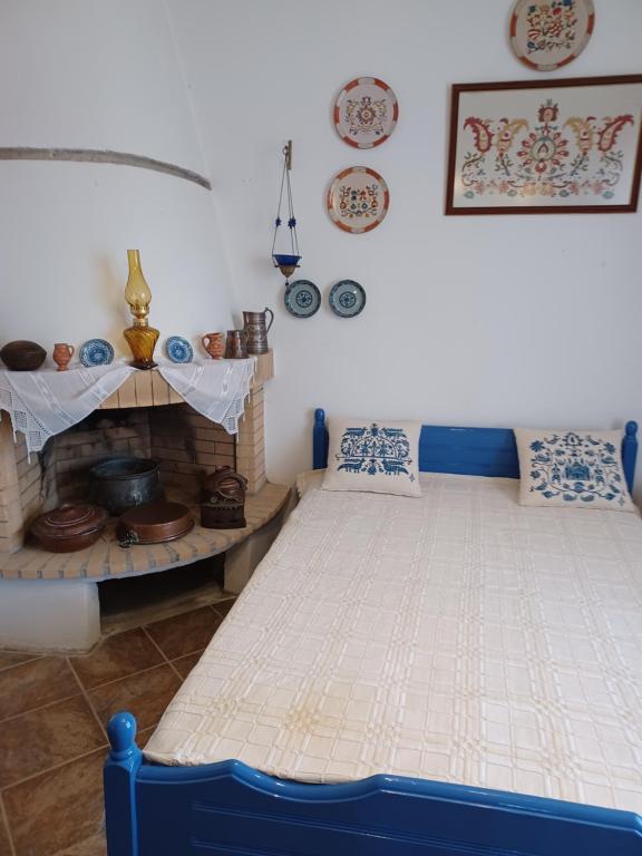 Postel nebo postele na pokoji v ubytování LALAROUS Studios & Apartments