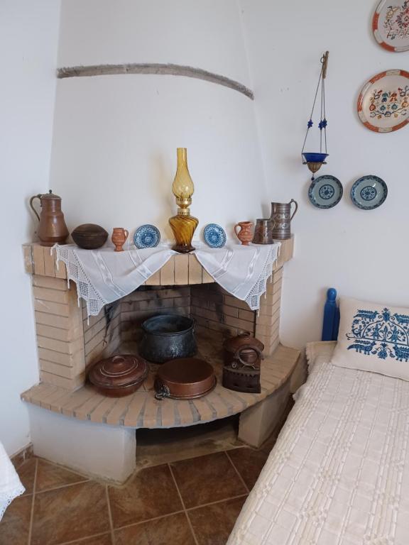 Postel nebo postele na pokoji v ubytování LALAROUS Studios & Apartments