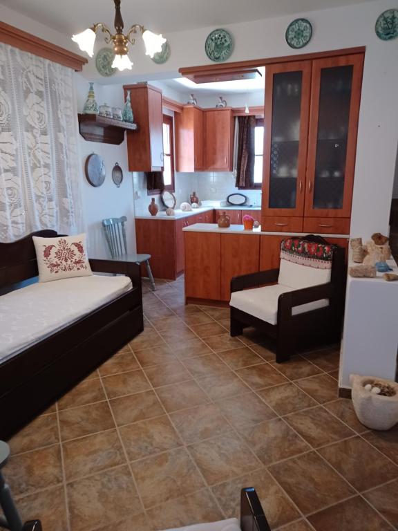 Kuchyň nebo kuchyňský kout v ubytování LALAROUS Studios & Apartments