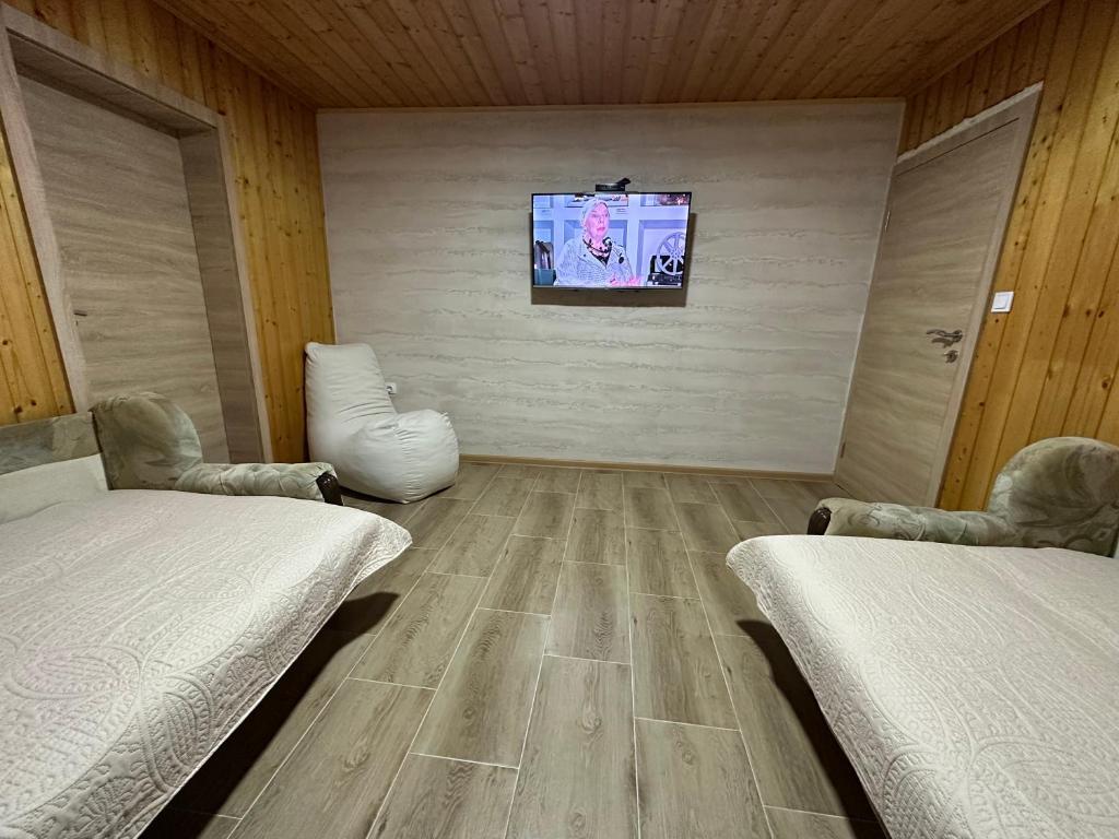 Postel nebo postele na pokoji v ubytování Pejovic apartmani Mojkovac