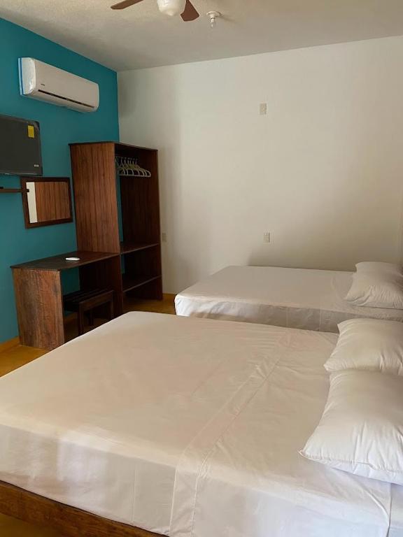 Postel nebo postele na pokoji v ubytování Casa Suites Minizoo