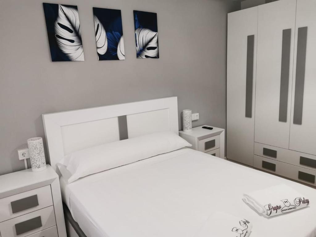 Postel nebo postele na pokoji v ubytování Playa Home Noja