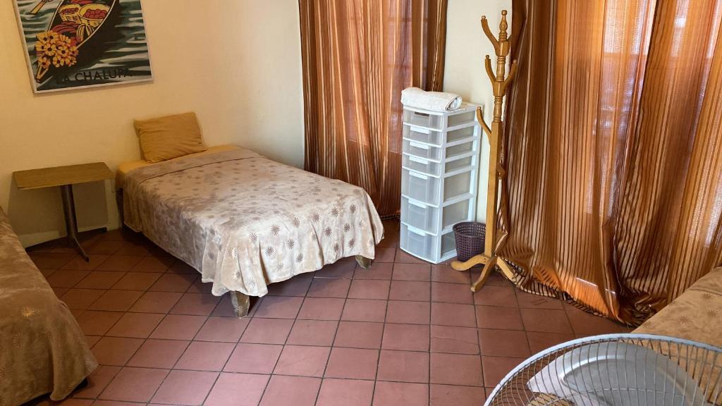 Postel nebo postele na pokoji v ubytování Hostal Santuario de las Libelulas