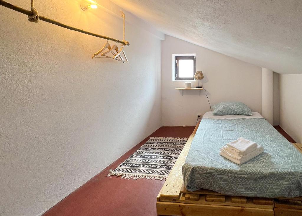 Postel nebo postele na pokoji v ubytování OV Apúlia
