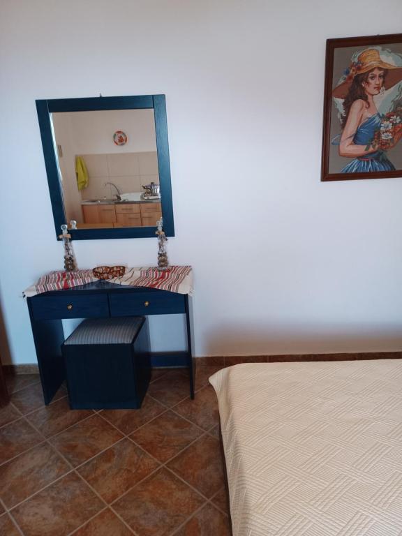 Postel nebo postele na pokoji v ubytování LALAROUS Studios & Apartments