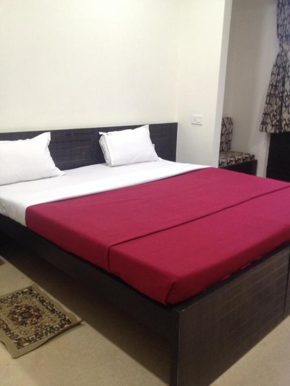 Postel nebo postele na pokoji v ubytování Hotel Nest International