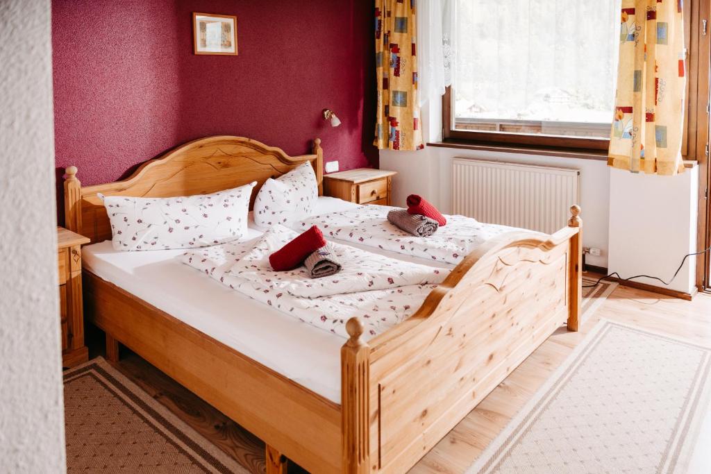 Postel nebo postele na pokoji v ubytování Gasthof Pension Kohlplatzl