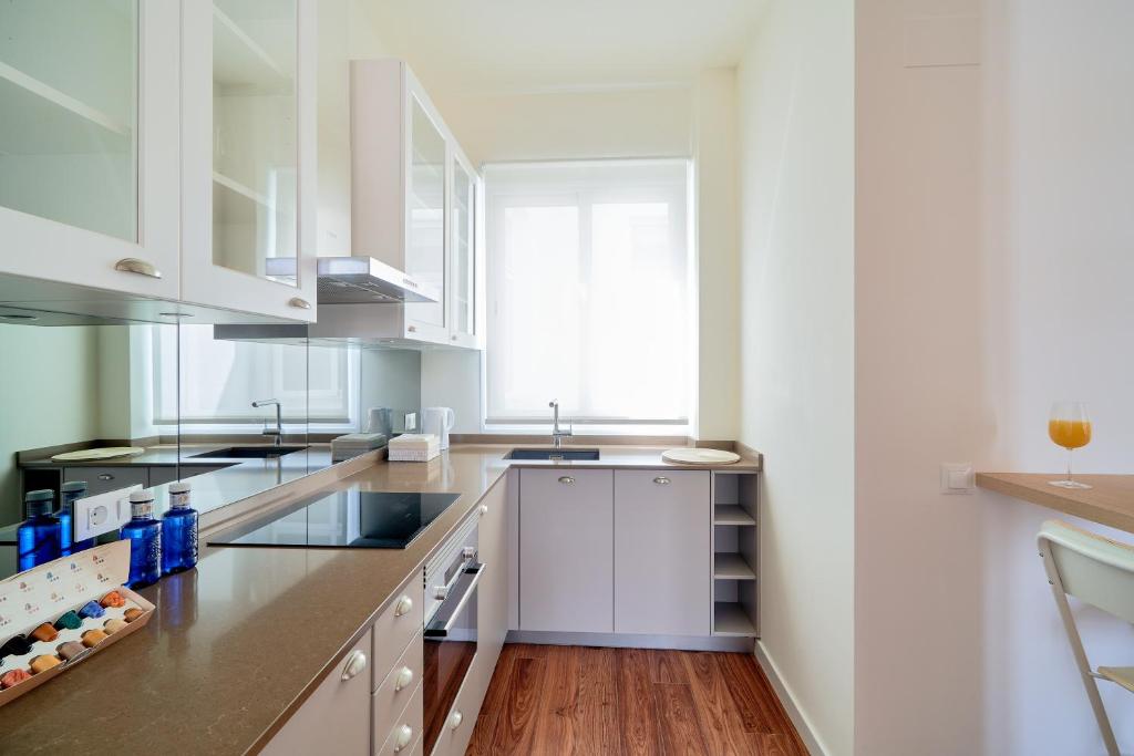 Kuchyň nebo kuchyňský kout v ubytování City Suite