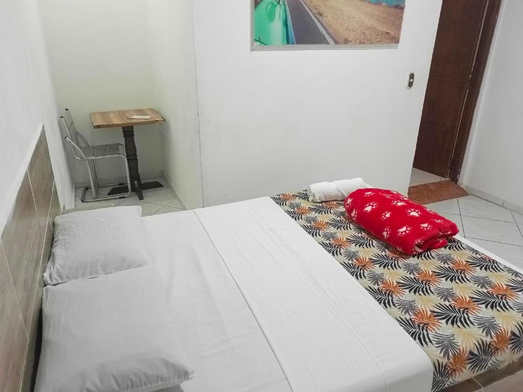 Postel nebo postele na pokoji v ubytování Hotel Brisas MEDELLIN