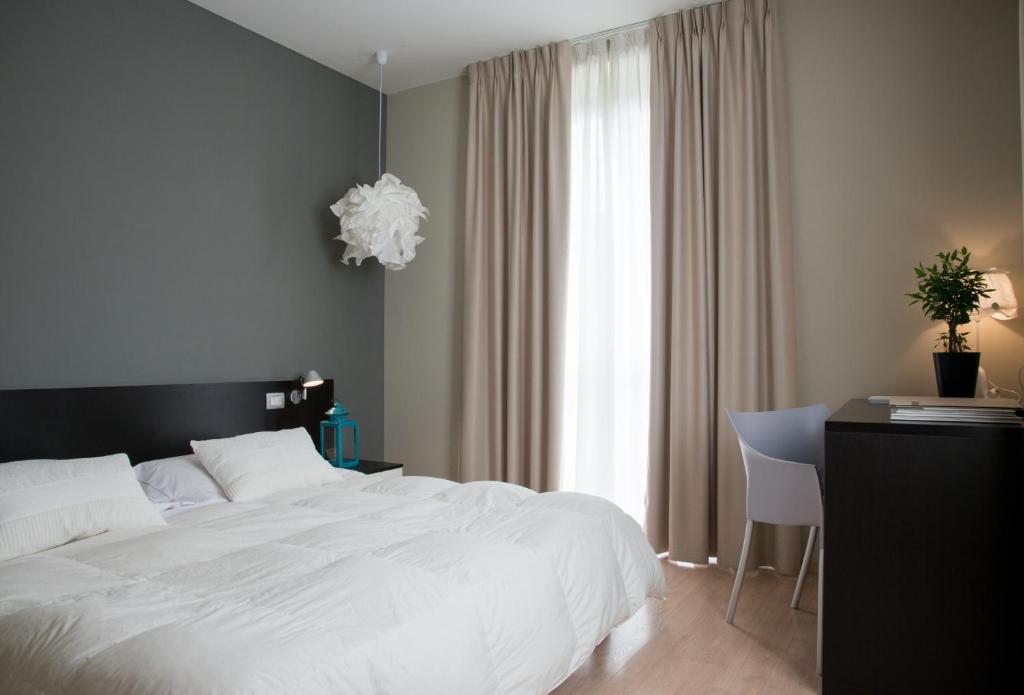 Postel nebo postele na pokoji v ubytování Berghotel