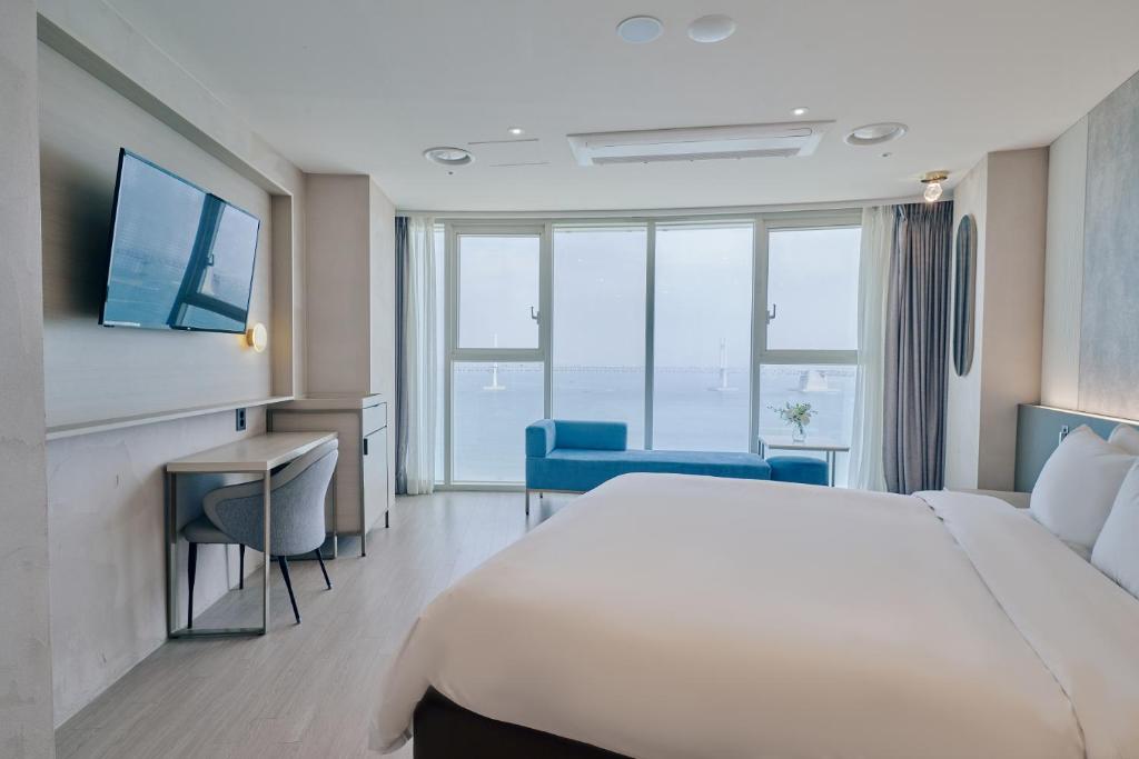 Postel nebo postele na pokoji v ubytování Hotel Aqua Palace