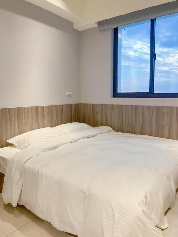 Postel nebo postele na pokoji v ubytování 飛鳥集行館