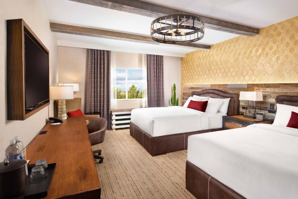 Ein Bett oder Betten in einem Zimmer der Unterkunft Silverton Casino Lodge