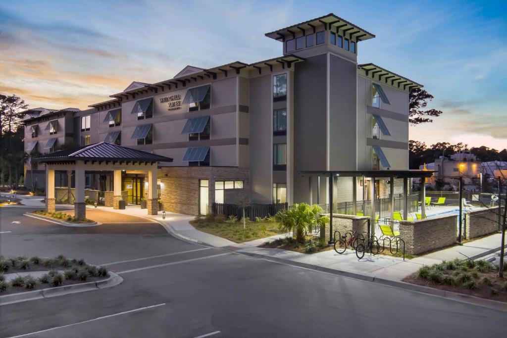 a rendering of a building with a parking lot at SpringHill Suites Hilton Head Island in Hilton Head Island