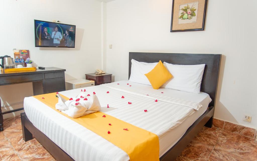 Postel nebo postele na pokoji v ubytování Best Central Point Hotel