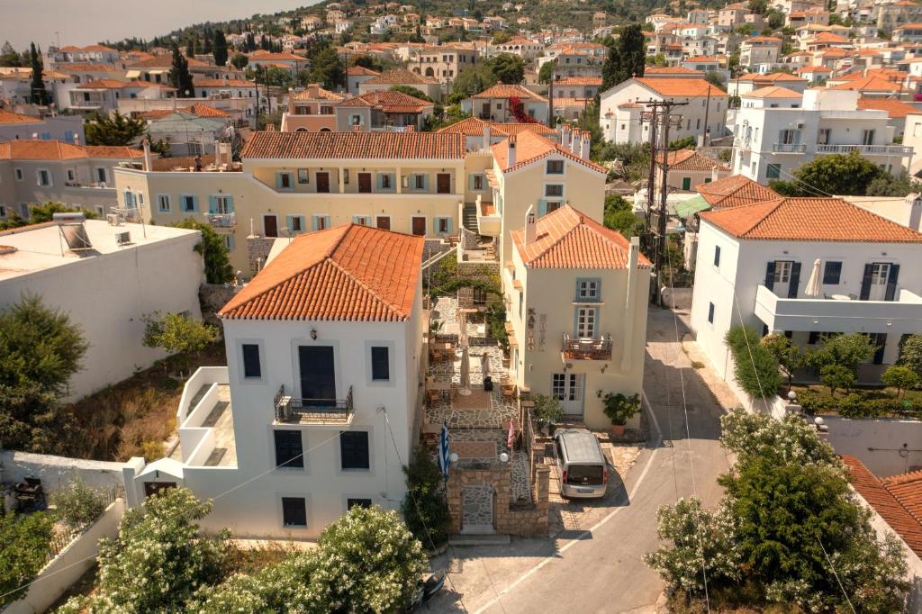 an aerial view of a town with white houses at Kastro Hotel in Spetses
