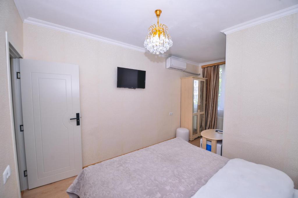 Postel nebo postele na pokoji v ubytování HOTEL VLADi