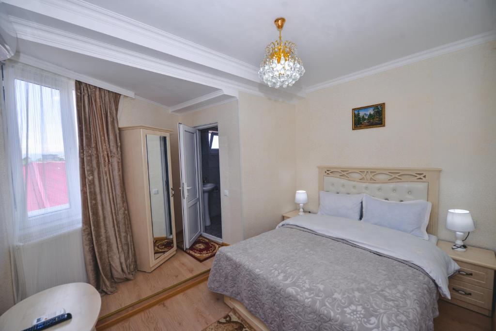 Postel nebo postele na pokoji v ubytování HOTEL VLADi