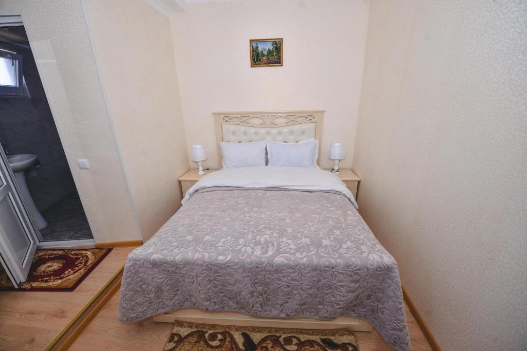 Postel nebo postele na pokoji v ubytování HOTEL VLADi