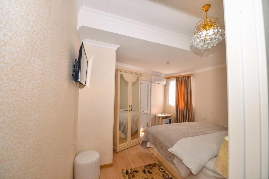 Postel nebo postele na pokoji v ubytování HOTEL VLADi
