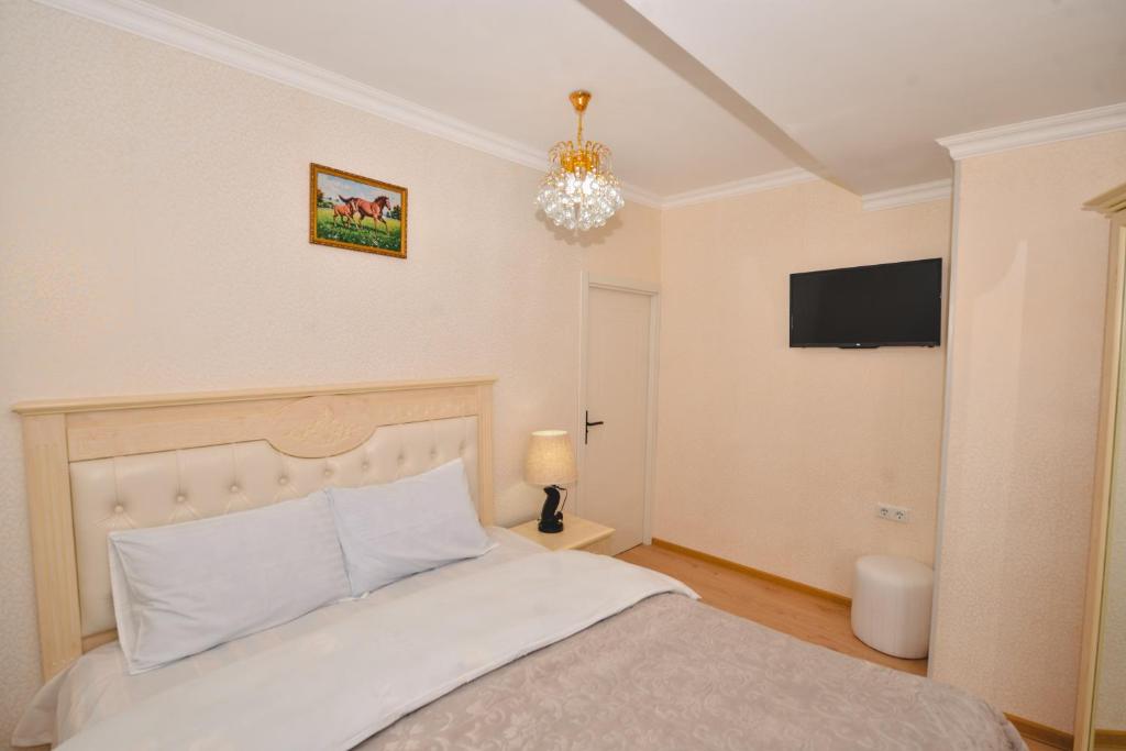 Postel nebo postele na pokoji v ubytování HOTEL VLADi