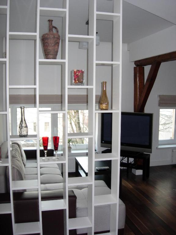 TV a/nebo společenská místnost v ubytování Studio in Kaunas City