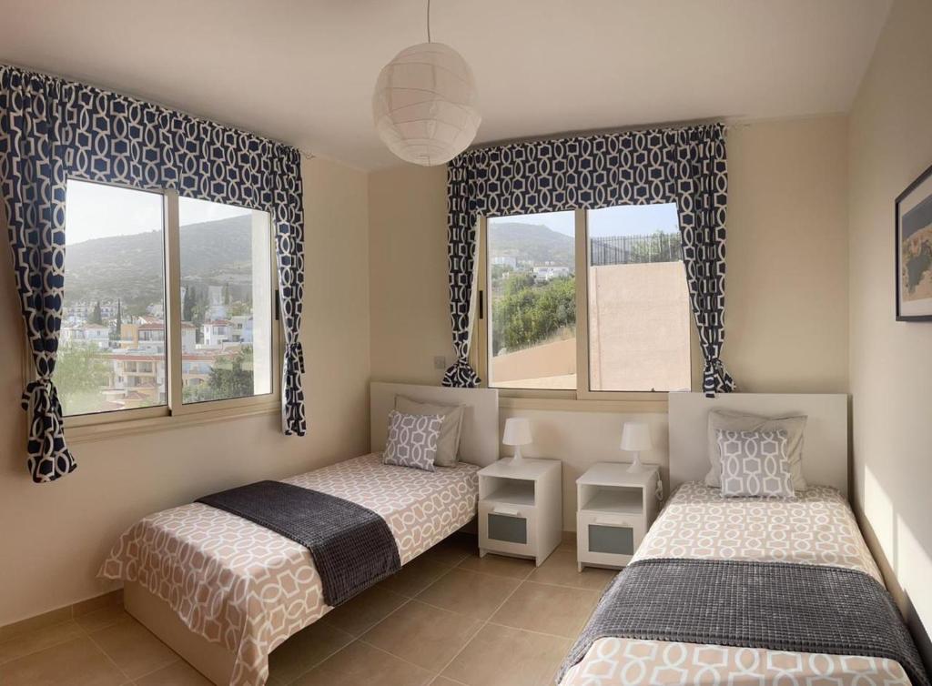 Säng eller sängar i ett rum på Hills&Seaview