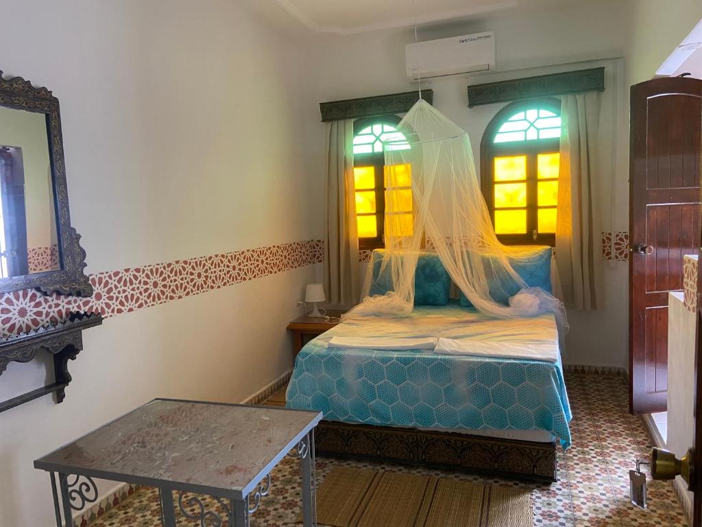 Postel nebo postele na pokoji v ubytování Riad Salt River