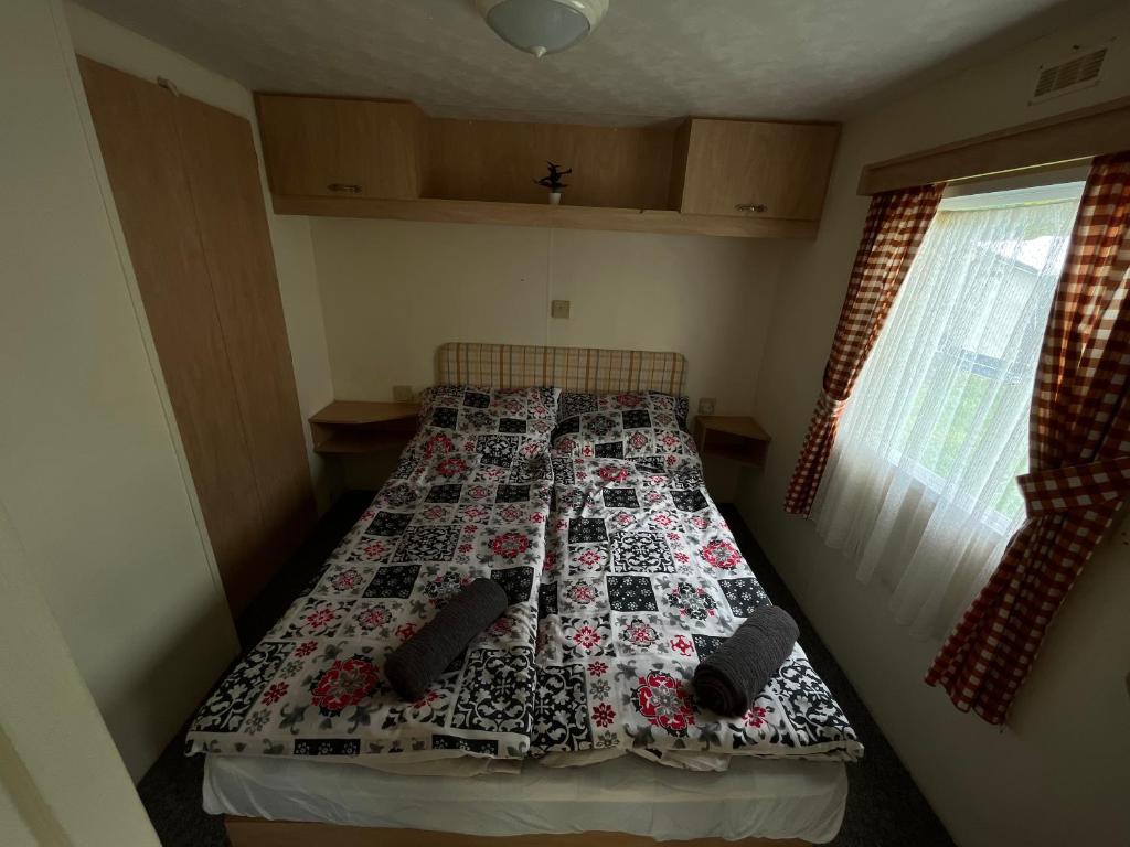 Postel nebo postele na pokoji v ubytování Autocamp Free Star - Mobilheimy