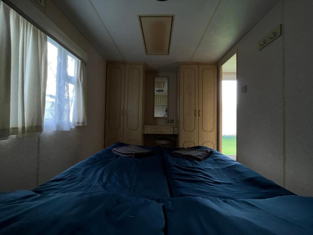 Postel nebo postele na pokoji v ubytování Autocamp Free Star - Mobilheimy