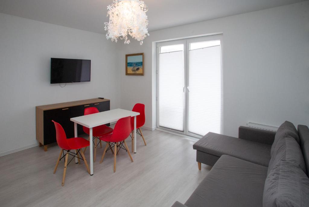 TV a/nebo společenská místnost v ubytování Stilo Hotel