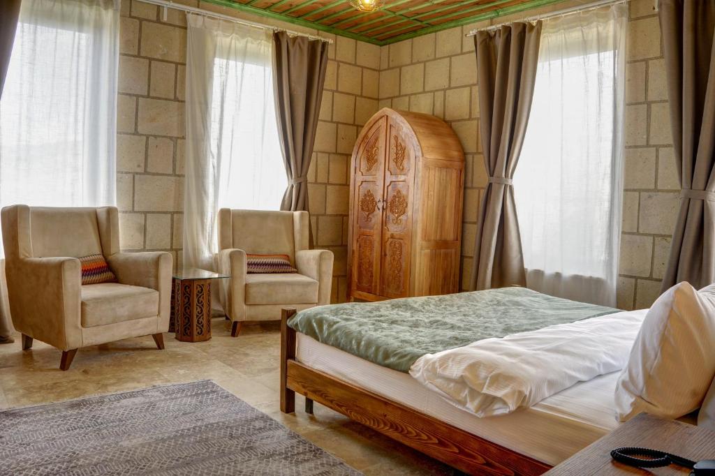 Postel nebo postele na pokoji v ubytování IVY Cappadocia