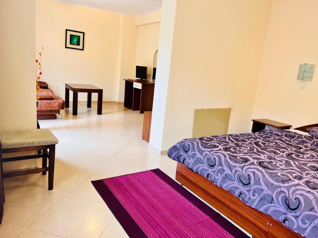 Postel nebo postele na pokoji v ubytování ArdoVel Park Hotel
