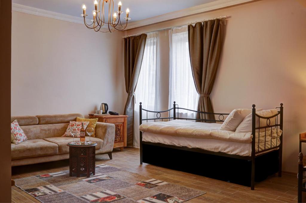 Postel nebo postele na pokoji v ubytování IVY Cappadocia