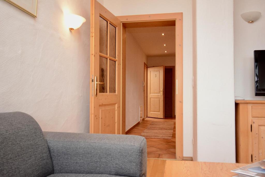 Televízia a/alebo spoločenská miestnosť v ubytovaní Appartement Oberschernthann