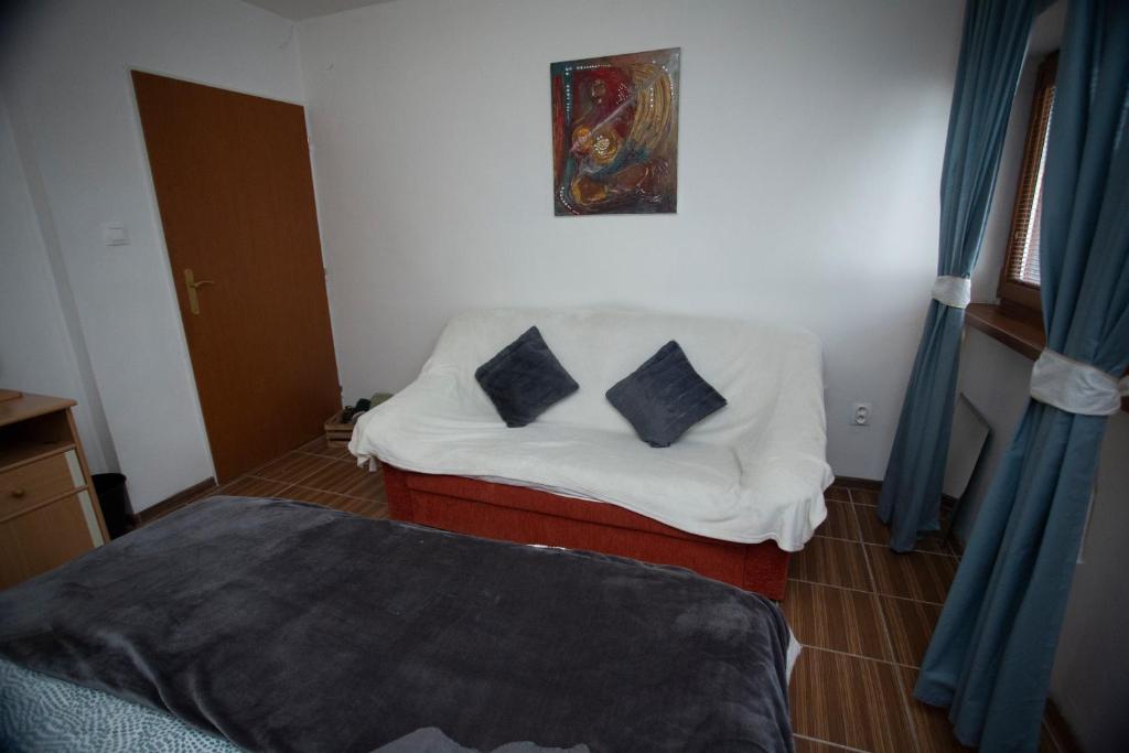 Postel nebo postele na pokoji v ubytování AG Apartment Gabčíkovo