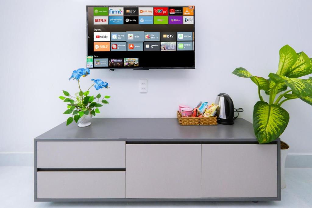 TV a/nebo společenská místnost v ubytování NatalieLe's Homestay