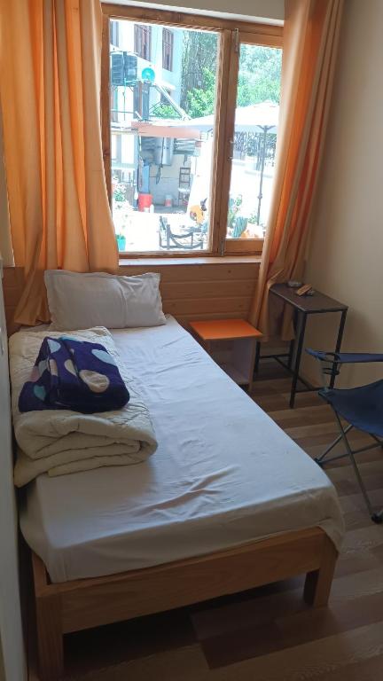 Letto o letti in una camera di Gonbo Guest House