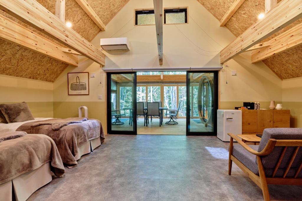 Postel nebo postele na pokoji v ubytování enico MtFuji Resort&Glamping