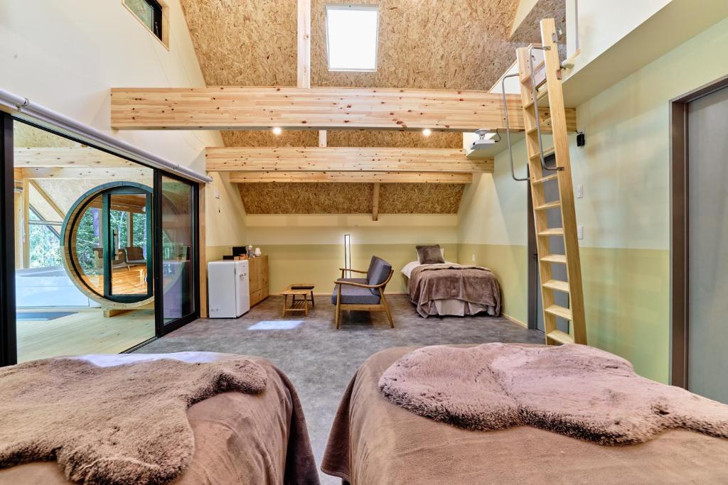 Postel nebo postele na pokoji v ubytování enico MtFuji Resort&Glamping