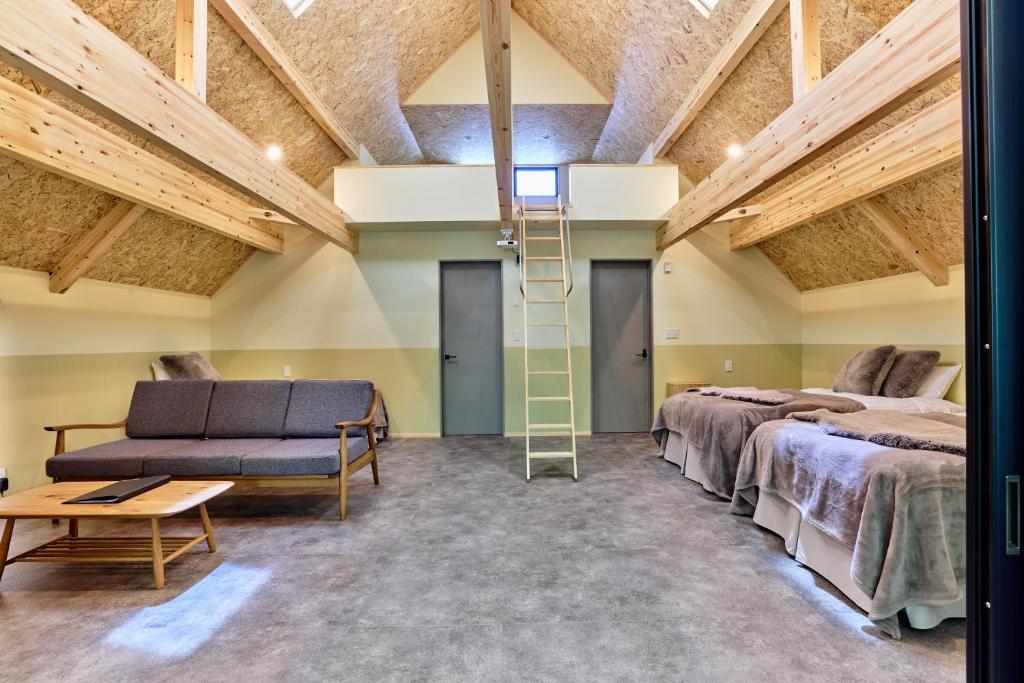 Postel nebo postele na pokoji v ubytování enico MtFuji Resort&Glamping